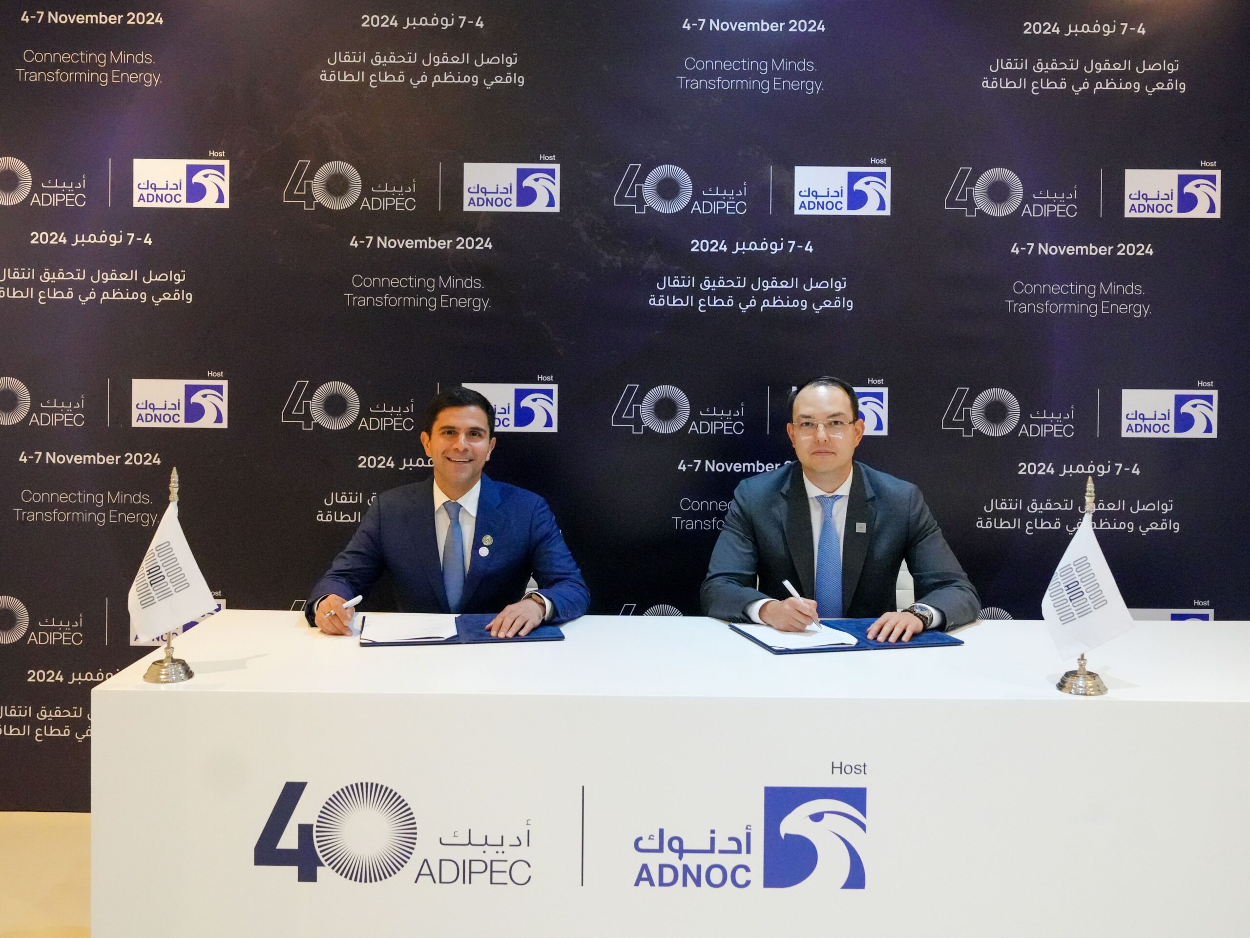 Matroid CEO Reza Zadeh and AIQ Acting Managing Director Magzhan Kenesbai sign the groundbreaking SCA with the intention of building the worlds largest CVAI Cluster.